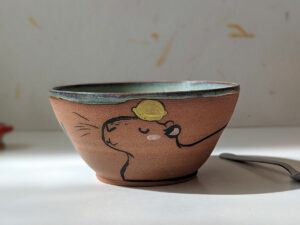 capybara red stoneware bowl with cute duck