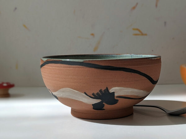 cute otter bowl red clay