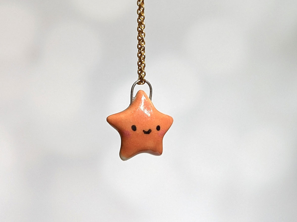 cut star pendant burnt orange