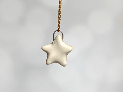 cut star pendant burnt orange