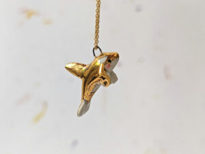 porcelain orca pendant with gold