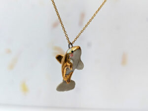 porcelain orca pendant with gold