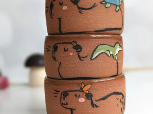 tumbler capybara and friend