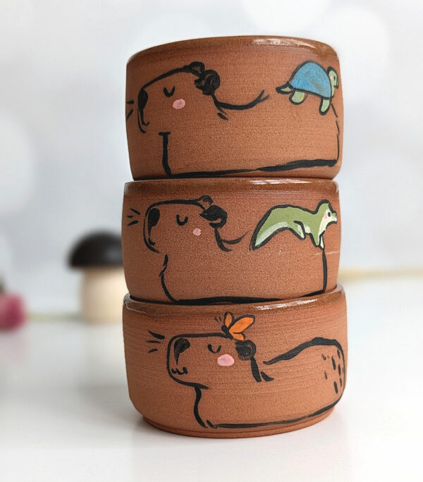tumbler capybara and friend