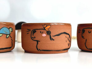 tumbler capybara and friend