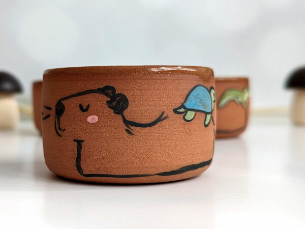 tumbler capybara and friend