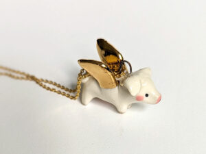 winged piglet pendant
