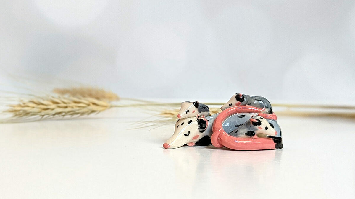 cute opossum family porcelain sculpture