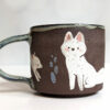 black mug white foxes