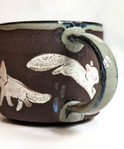 black mug white foxes