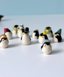 figurine of little porcelain penguins