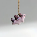 purple stegosaurus pendant cute porcelain jewelry by kness
