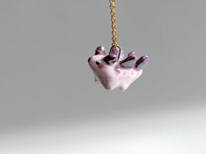 purple stegosaurus pendant cute porcelain jewelry by kness