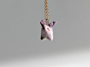 purple stegosaurus pendant cute porcelain jewelry by kness