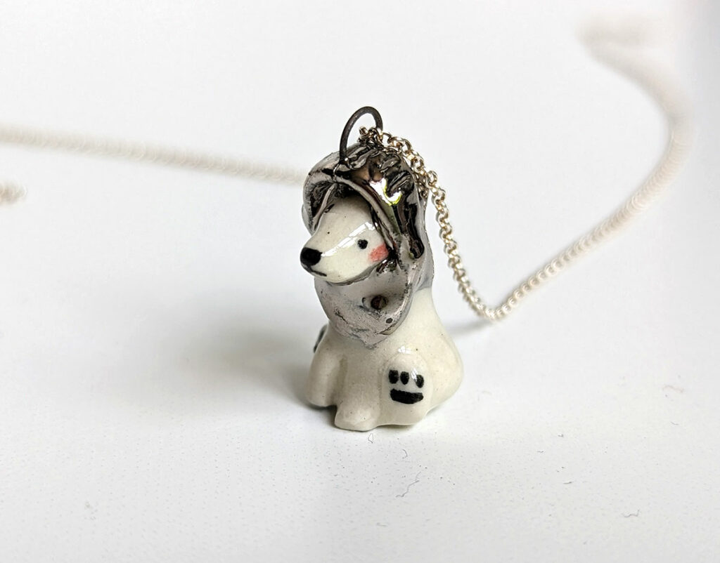 polar bear in a knight's helmet pendant 