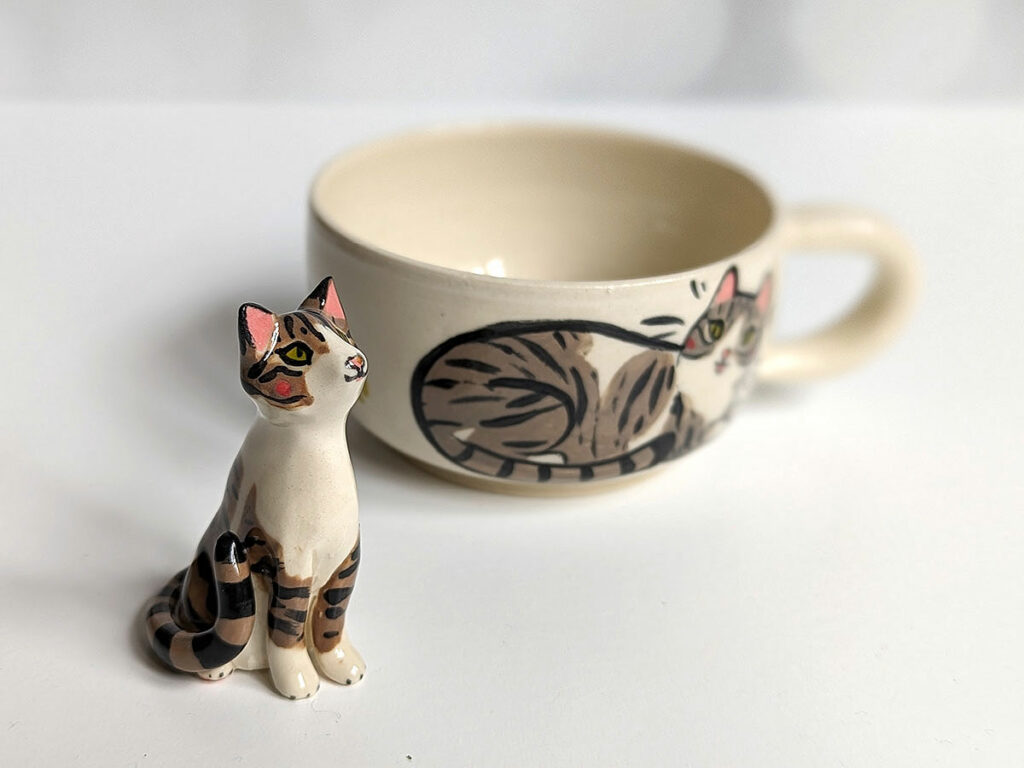 a cup and a cat