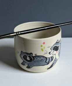 handmade stoneware artist cup for painting raccoons