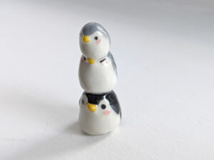penguin stack figurine
