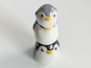 penguin stack figurine