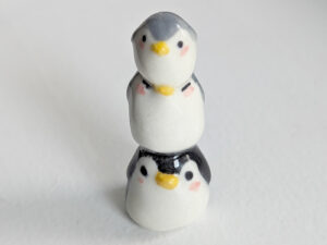 penguin stack figurine