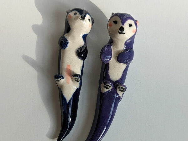 otters couple blue