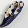 otters couple blue