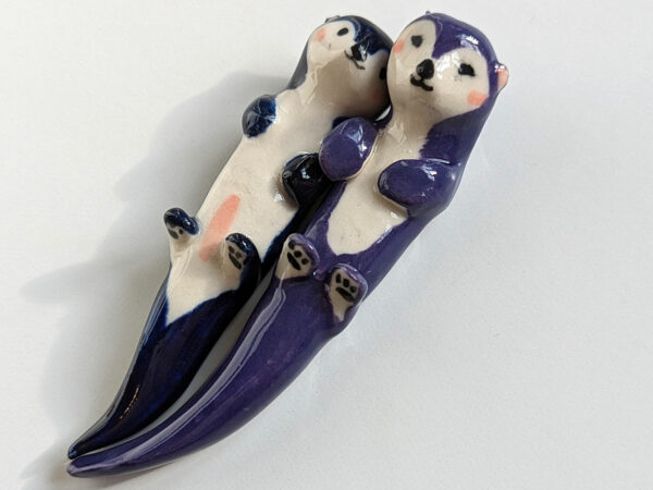 otters couple blue