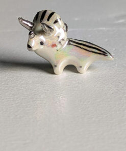 adorable triceratops porcelain pendant