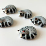 figurine raccoon