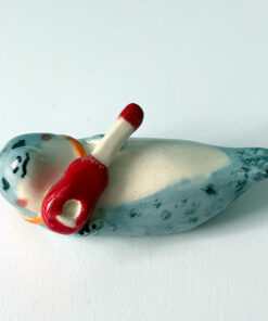 adorable seal playing guitar figurine