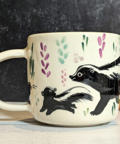 cute mug skunk family