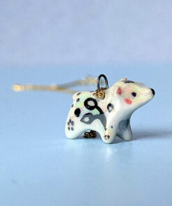 lovely polar bear pendant with white gold leafy pattern by kness