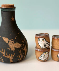 pretty ceramic sake set with 4 shots and decorated with owls