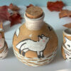 one o fa kind collectible handmade ceramic sake set painted with white foxes
