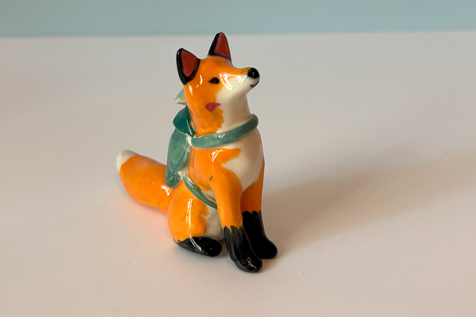 adorable figurine of a fox in a backpack with a passenger handmade in Canada by Kness