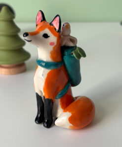 adorable figurine of a fox in a backpack with a passenger handmade in Canada by Kness