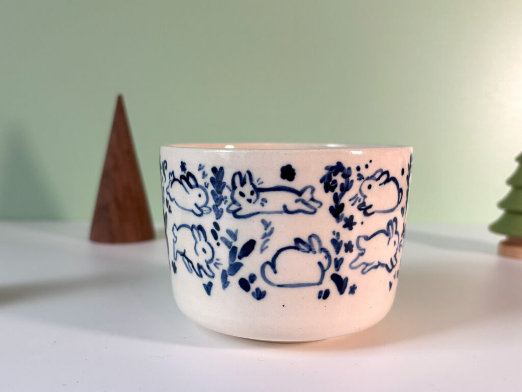 adorable bunny cup in royal blue on white porcelain