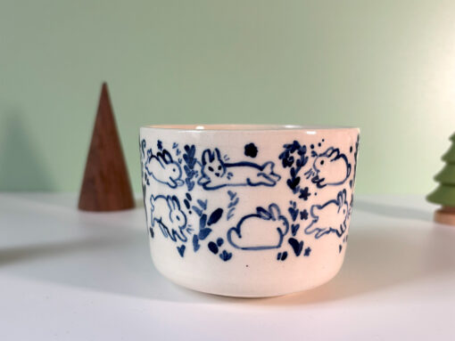 adorable bunny cup in royal blue on white porcelain