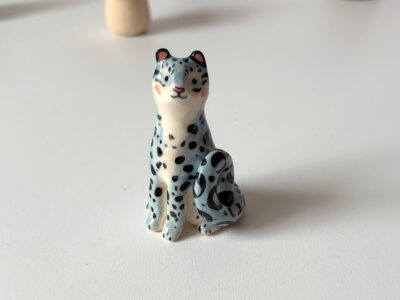 adorable snow leopard figurine, handmade in Canada