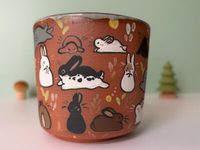 cup too many bunnies in red clay