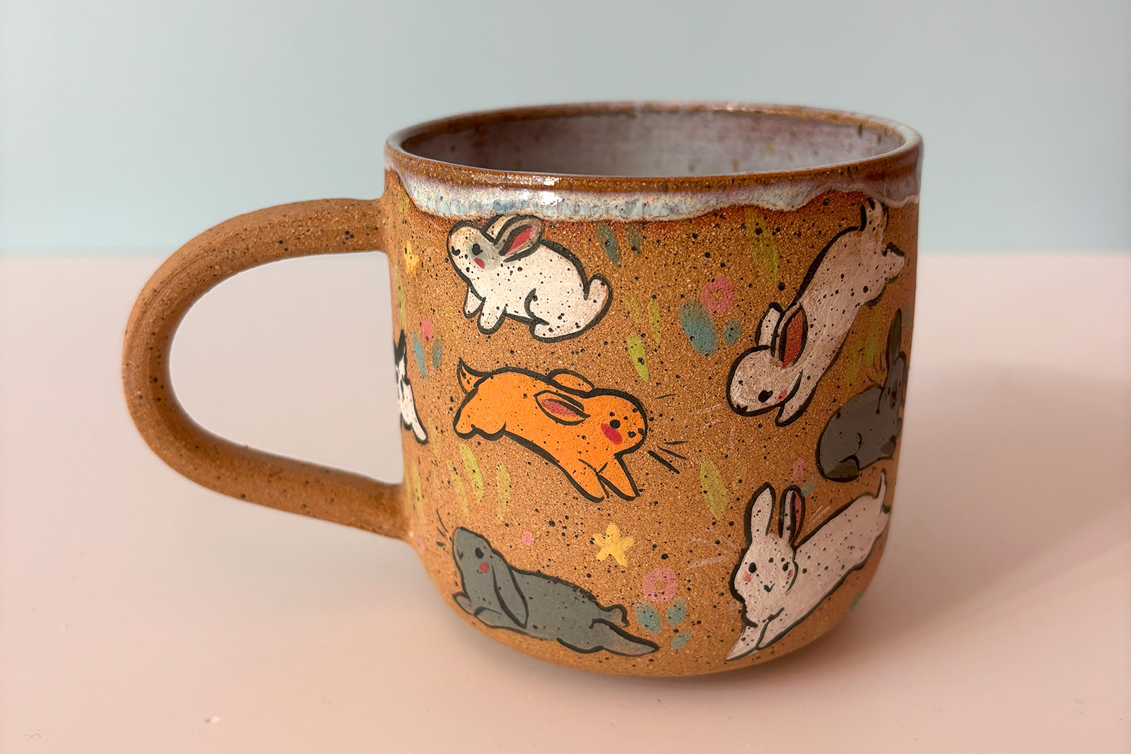 speckled mug with too many bunnies