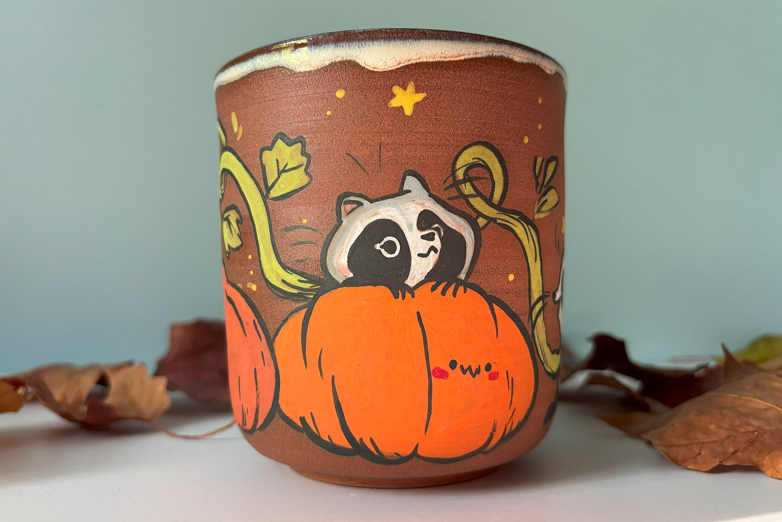 pumpkin raccoon cup