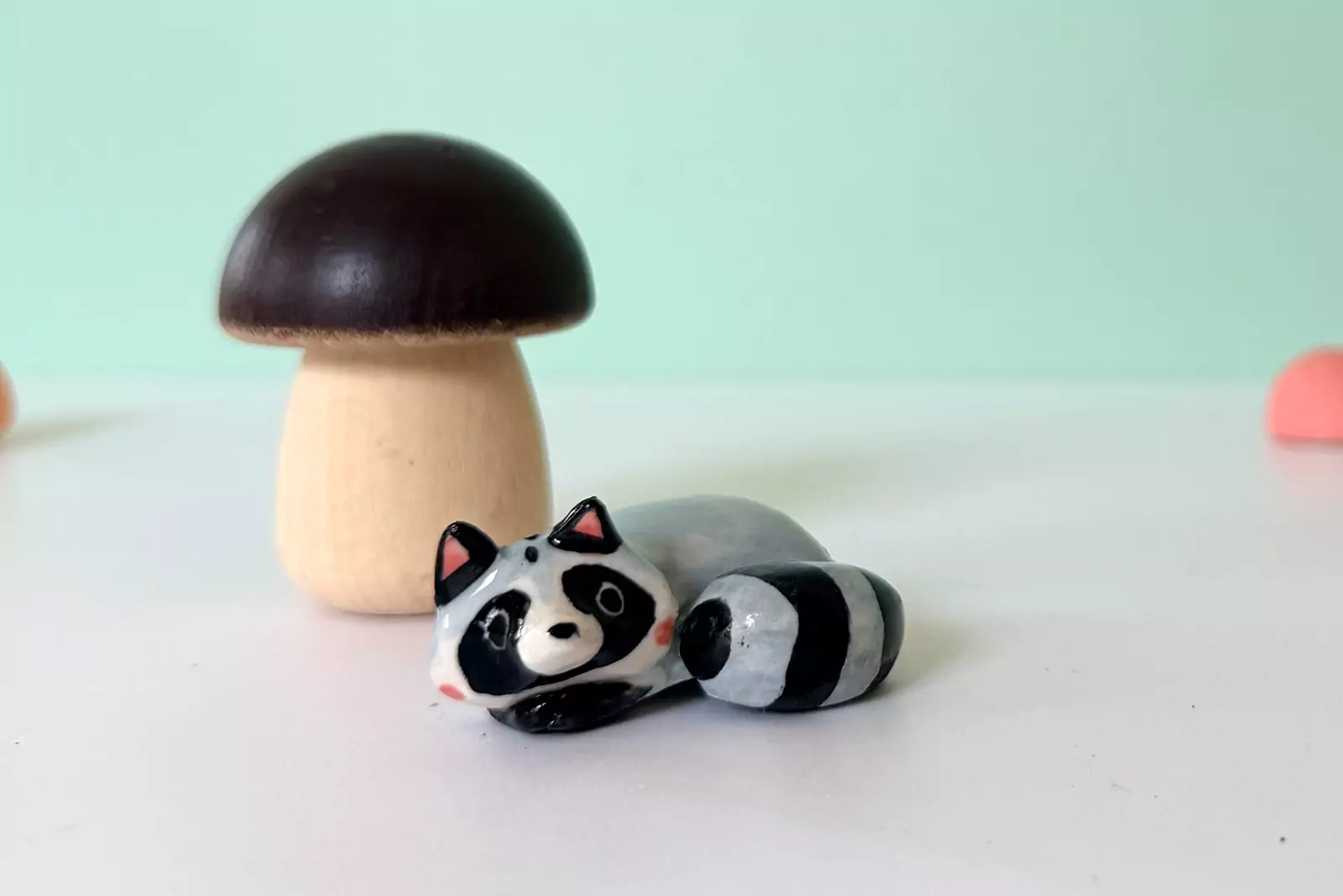 Porcelain Figurine - Sleepy Raccoon